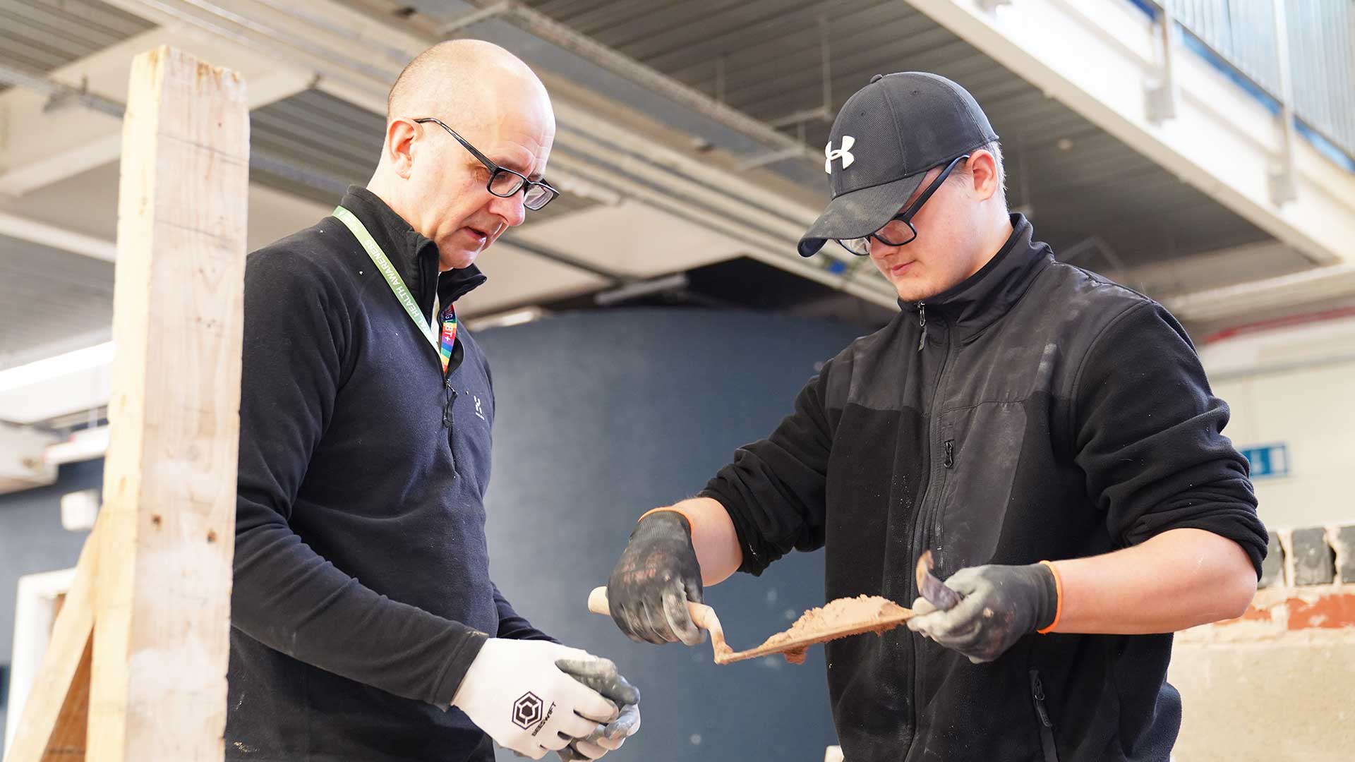 College Governors Get Hands-On Experience with Bricklaying Students