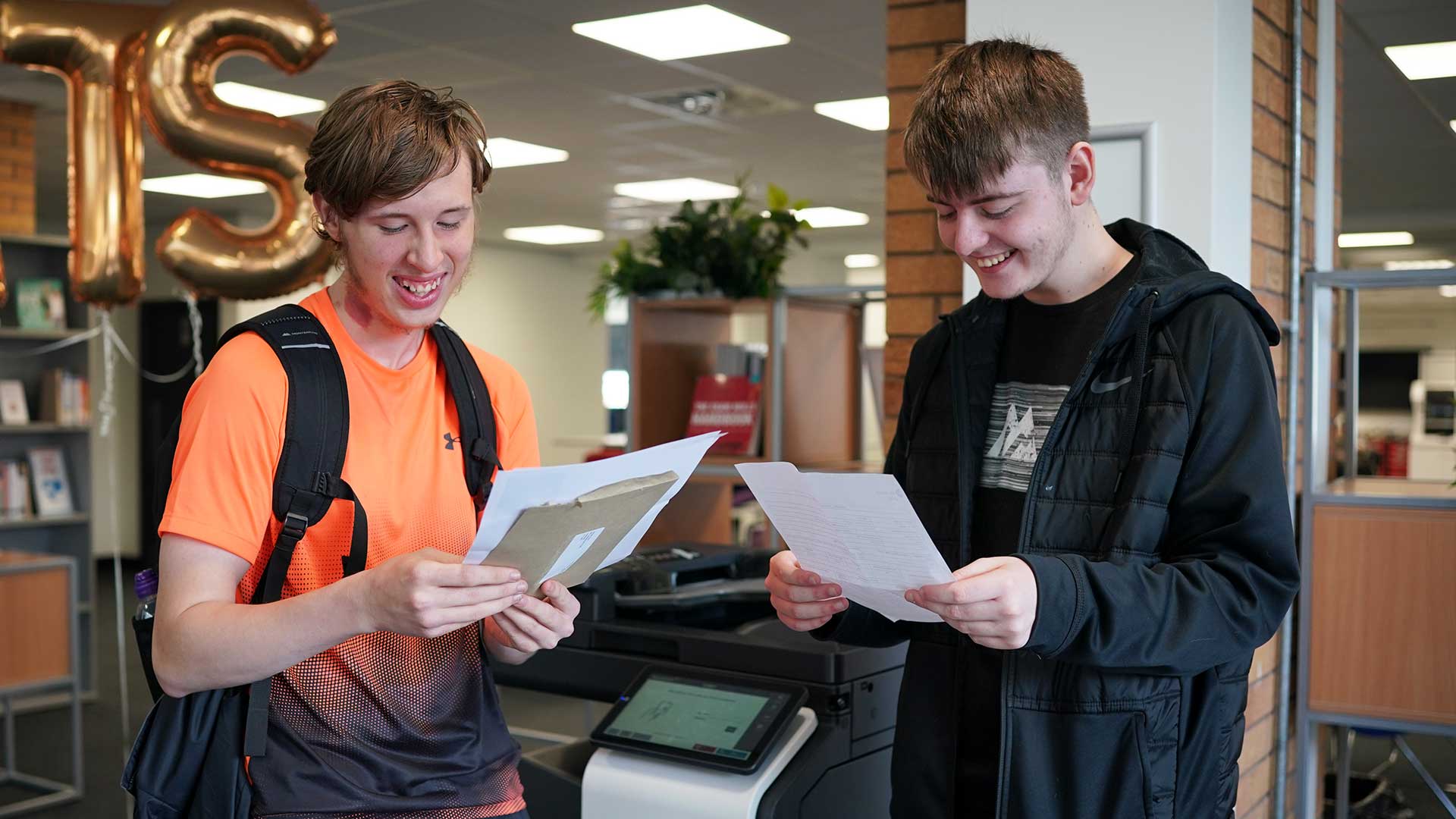 Students receiving their results.